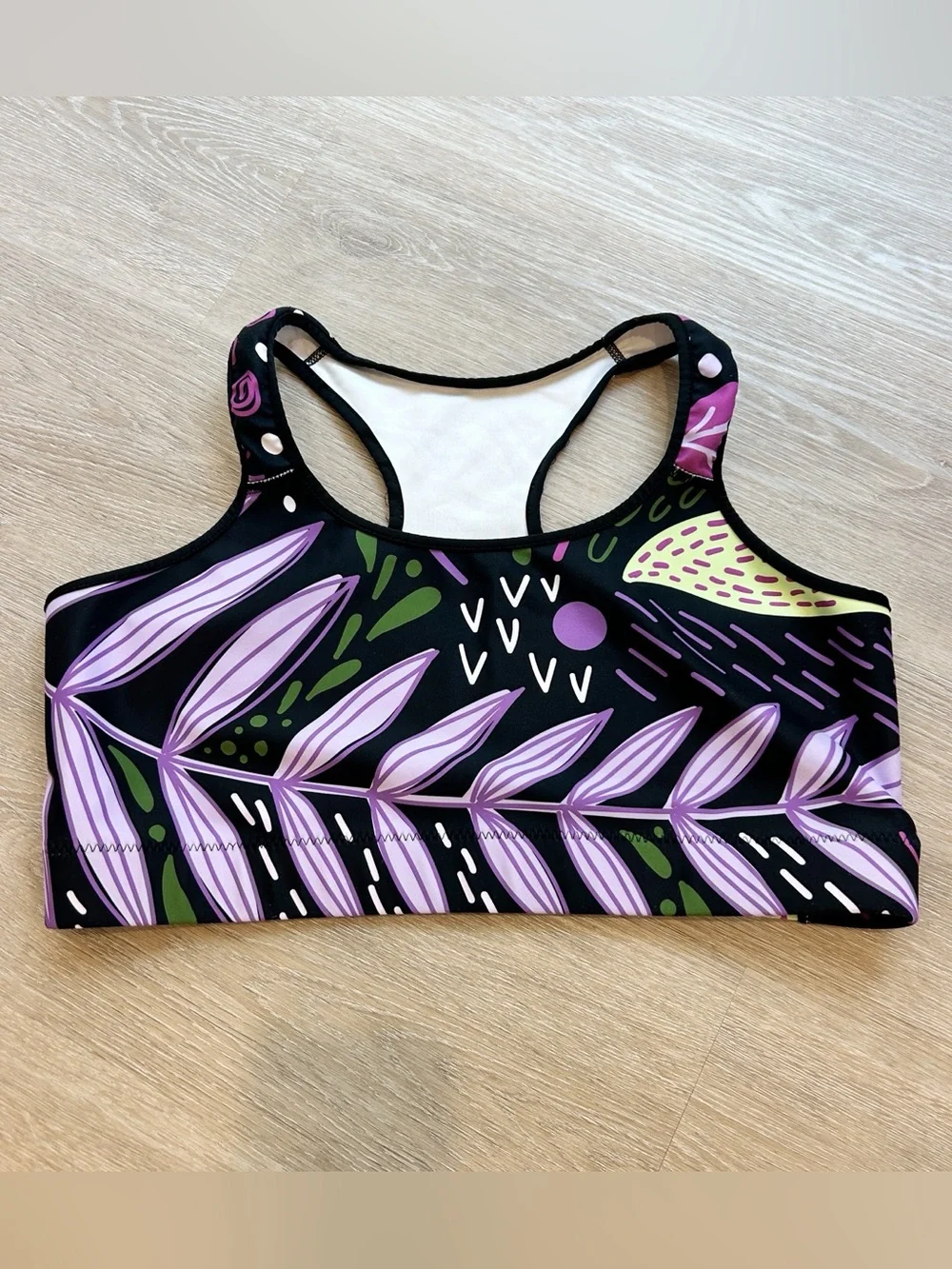 Loony Legs sports bra with purple/green leaf design size XL